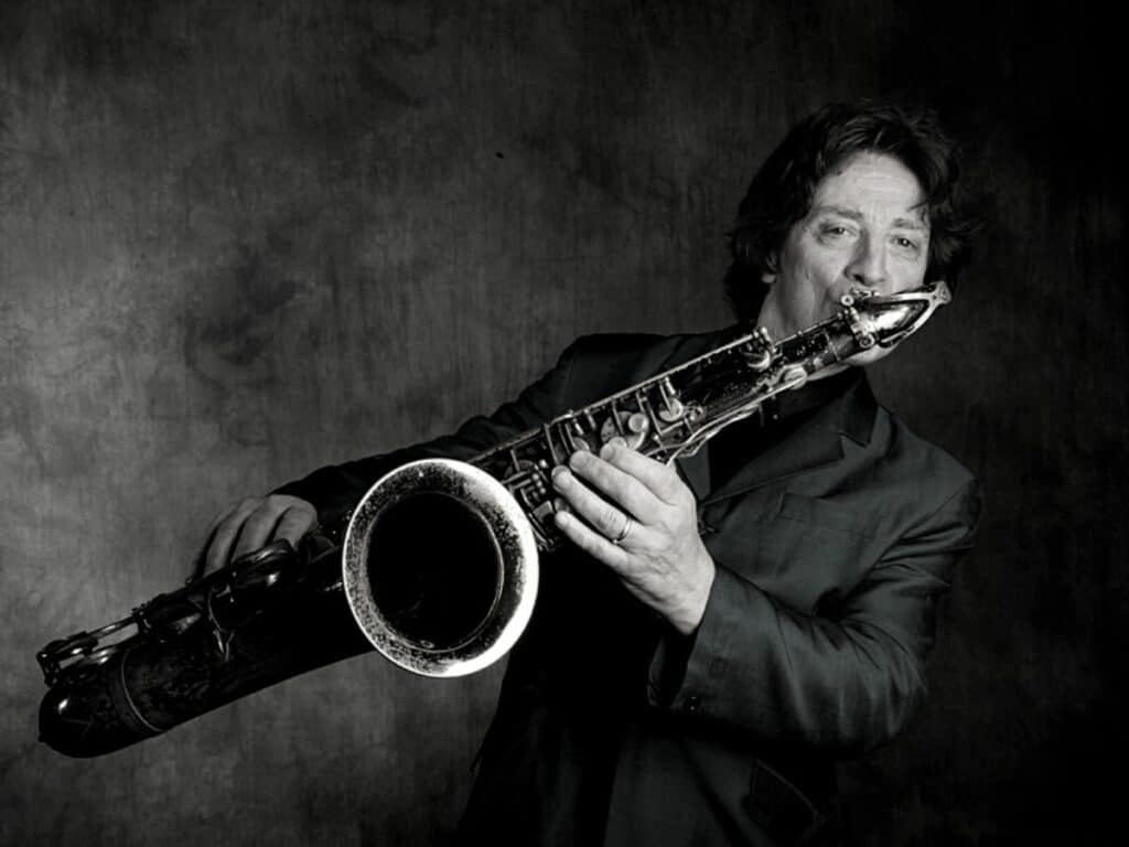 Photo of Crispin Cioe Playing the Saxophone with Street Filter 